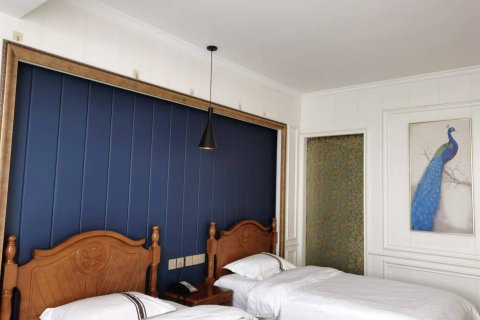 宁陵美巢家园酒店