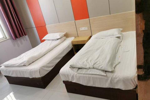 贵安商务宾馆(嘉祥一中萌山校区唐宁街店)