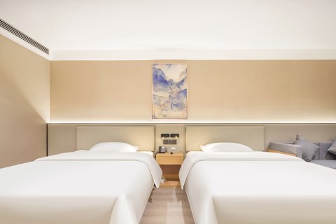 悦巢印象时尚酒店(新蔡汽车站碧乐汇店)