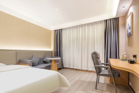 悦巢印象时尚酒店(新蔡汽车站碧乐汇店)