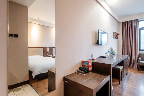 新安蓝瓦房商务酒店