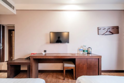 新安蓝瓦房商务酒店