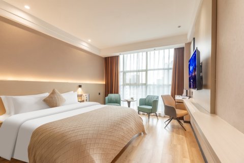 久龙腾晖酒店(修文县客运站人民医院店)