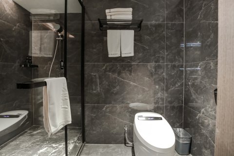 久龙腾晖酒店(修文县客运站人民医院店)