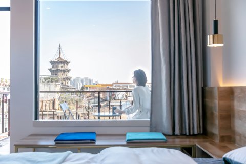 SlowHouse 吾问东西民宿(西街开元寺店)