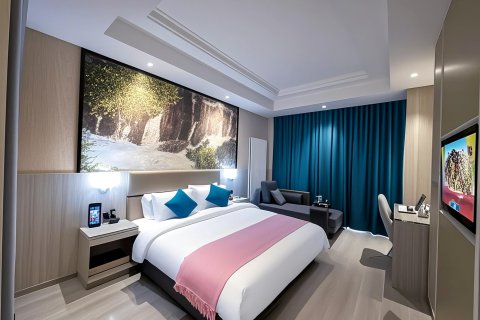 崟瑞轻雅酒店(什邡大广场店)