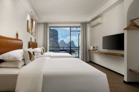 古岸悦风酒店(阳朔遇龙河旅游度假区千古情店)