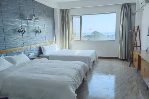 北海红风车假日酒店(侨港风情街侨港海滩店)