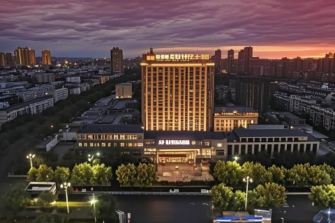 汇泉丽都酒店(奎屯友好商场红旗小吃街店)