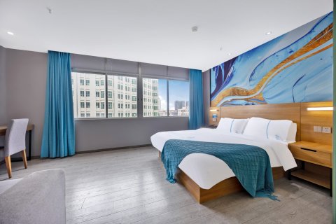 兰丽百合E Hotel(阳江汽车总站君怡广场店)