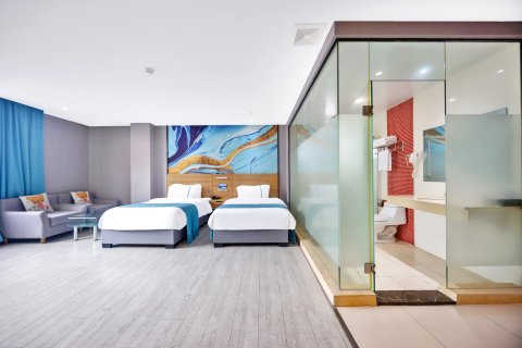 兰丽百合E Hotel(阳江汽车总站君怡广场店)