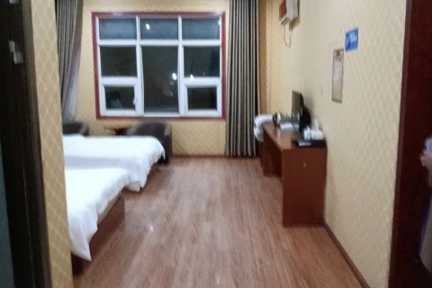 理塘轩源大酒店