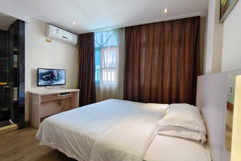 河池三月花时尚酒店(河池学院宜州汽车总站店)