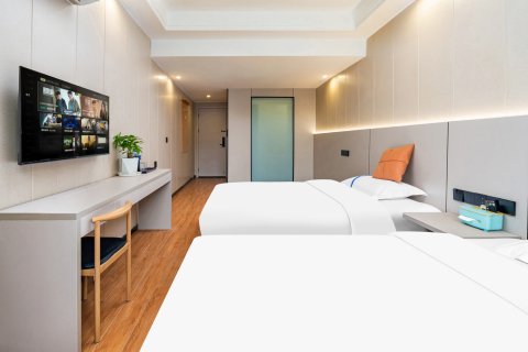 布丁严选酒店(射洪开源门店)