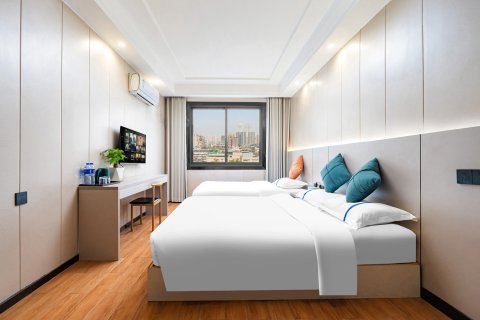 布丁严选酒店(射洪开源门店)