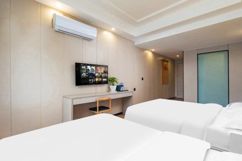 布丁严选酒店(射洪开源门店)