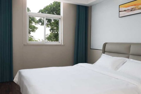 乌拉假日酒店(汝州金庚康复医院店)