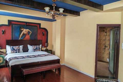 安宁人味梓巢酒店