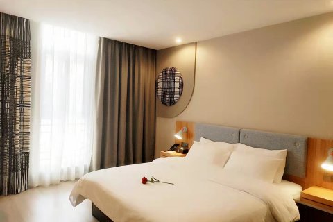 谊家酒店(广安金安大道市民广场店)