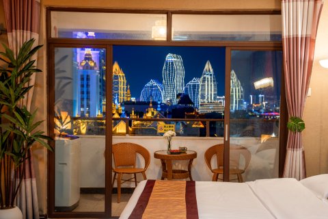 西双版纳告庄江景湾酒店(告庄西双景星光夜市店)