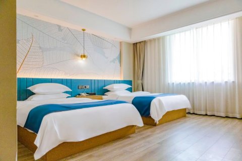 北川尔玛假日酒店(北川中学耍都商业广场店)