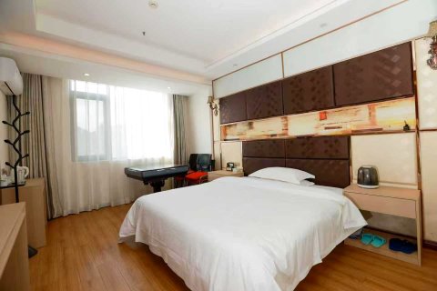 普定林城大酒店