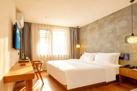 曼·酒店(昆明火车站塘子巷地铁站店)