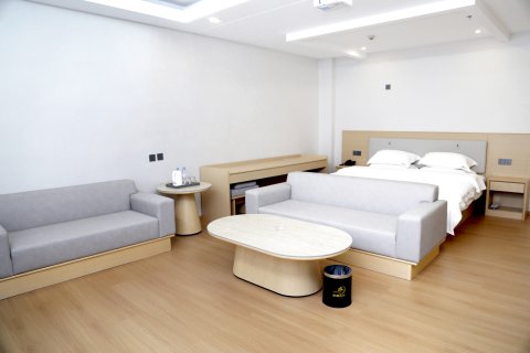 易县木棉花开精选酒店(盛源广场店)