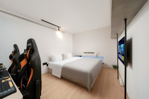 趣屋travel电竞酒店(观音桥龙湖新壹街店)