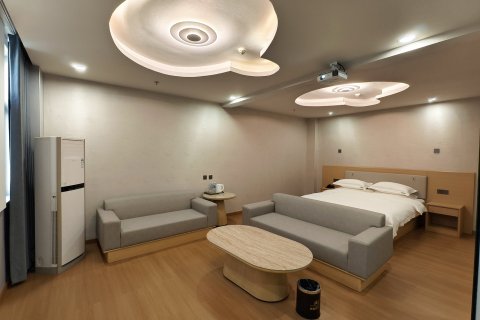 易县木棉花开精选酒店(盛源广场店)