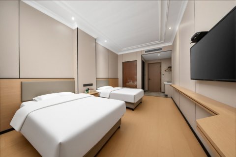 尚辰商务宾馆(信阳火车站店)