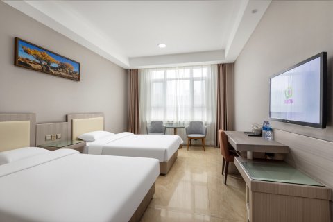 兵客西岐商务宾馆(奎屯市友好时尚购物中心店)