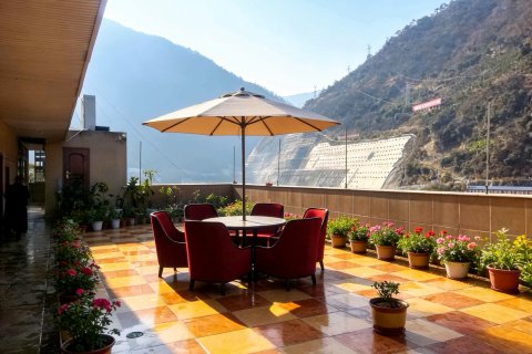 石棉栖岸大酒店