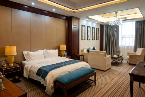 石棉栖岸大酒店