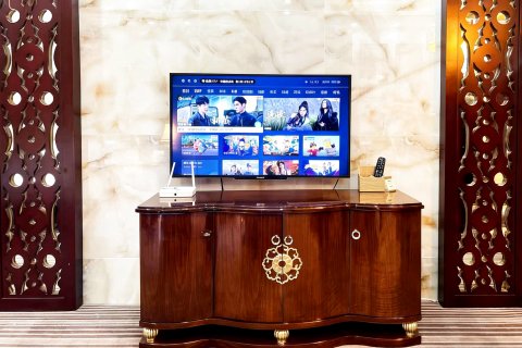 石棉栖岸大酒店